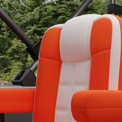Orange solid fabric seat cushions in a sporty off-road vehicle with a black metal frame outdoors.