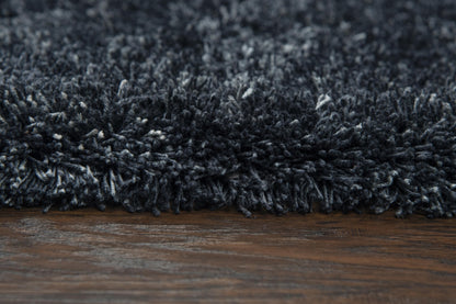 5x8 black shag area rug with ultra plush tall pile, hand tufted soft polyester rug for living room and bedroom, cozy modern solid rug with cotton canvas backing, durable high pile shag rug for contemporary home decor, soft textured charcoal rug for stylish interiors