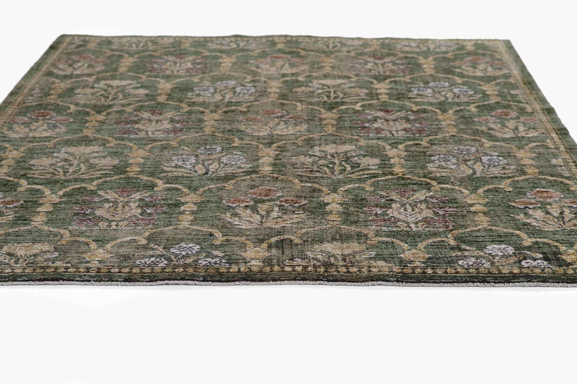 Rectangular green oriental rug with beige floral damask pattern; woven, traditional Persian-style decor.