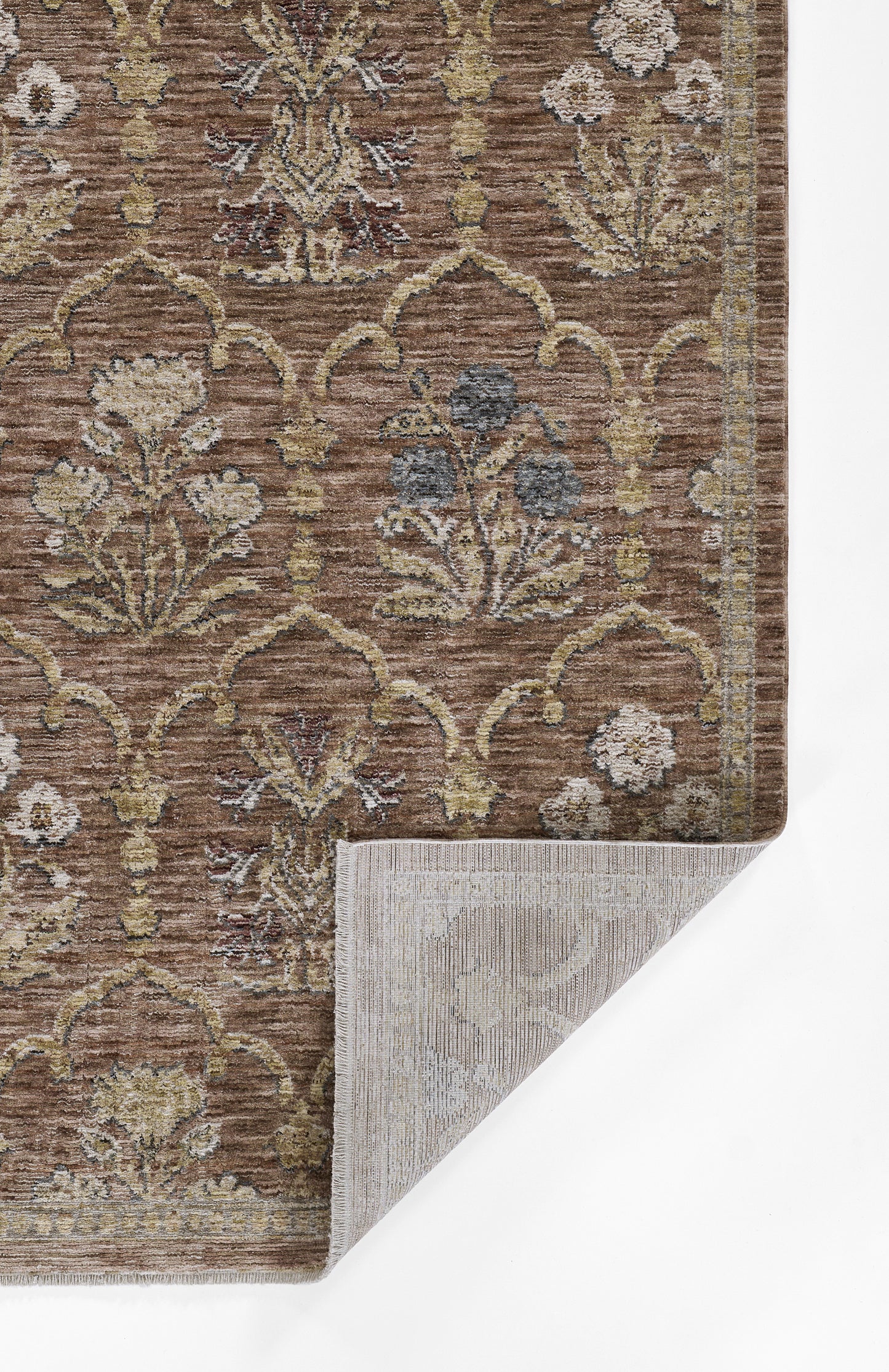 Brown ornamental runner rug with beige and cream floral lattice, antique Persian-inspired, corner folded to reveal gray backing.