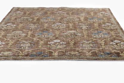Rectangular oriental runner rug with brown field, ivory floral motifs, blue accents, fringed border, wool texture, vintage style.