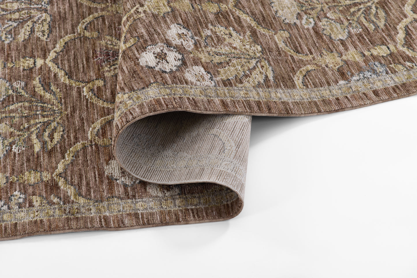 Brown oriental-style 2' x 8' runner rug with cream floral vines; low-pile, folded corner revealing beige backing.