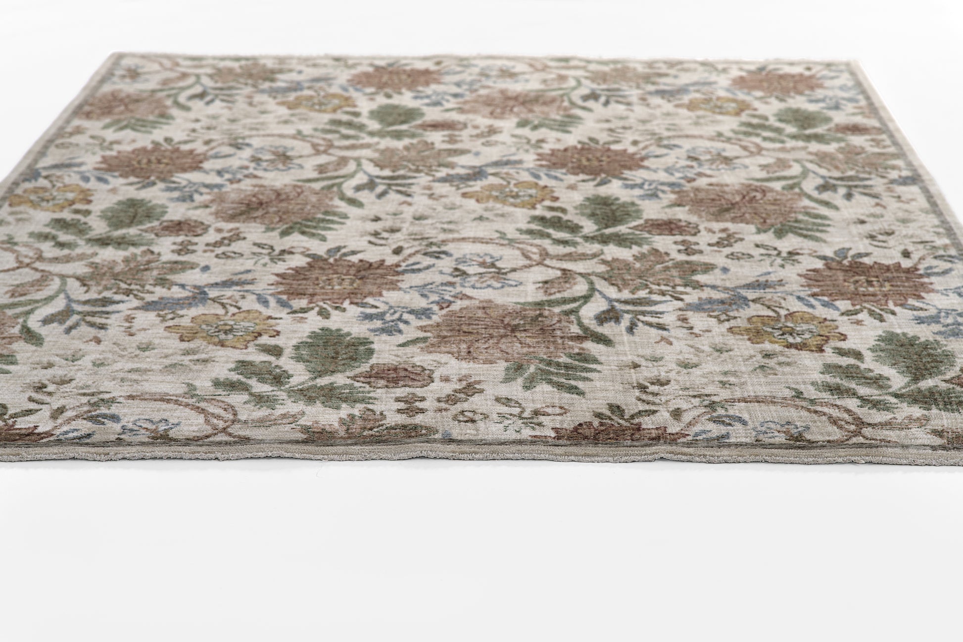 Rectangular oriental floral runner rug with ivory base, multicolor blossoms in green, brown, blue & gold, gray border, 2' x 8'.