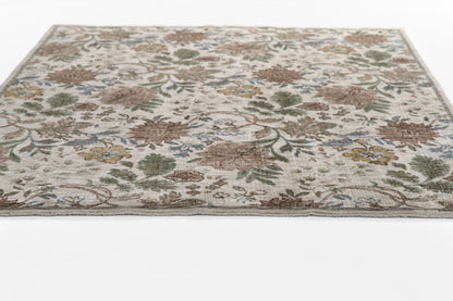 Rectangular oriental floral runner rug with ivory base, multicolor blossoms in green, brown, blue & gold, gray border, 2' x 8'.