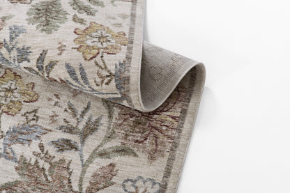 Beige floral damask runner with muted blue, green, and rose accents; woven texture, rolled edge, vintage oriental style.