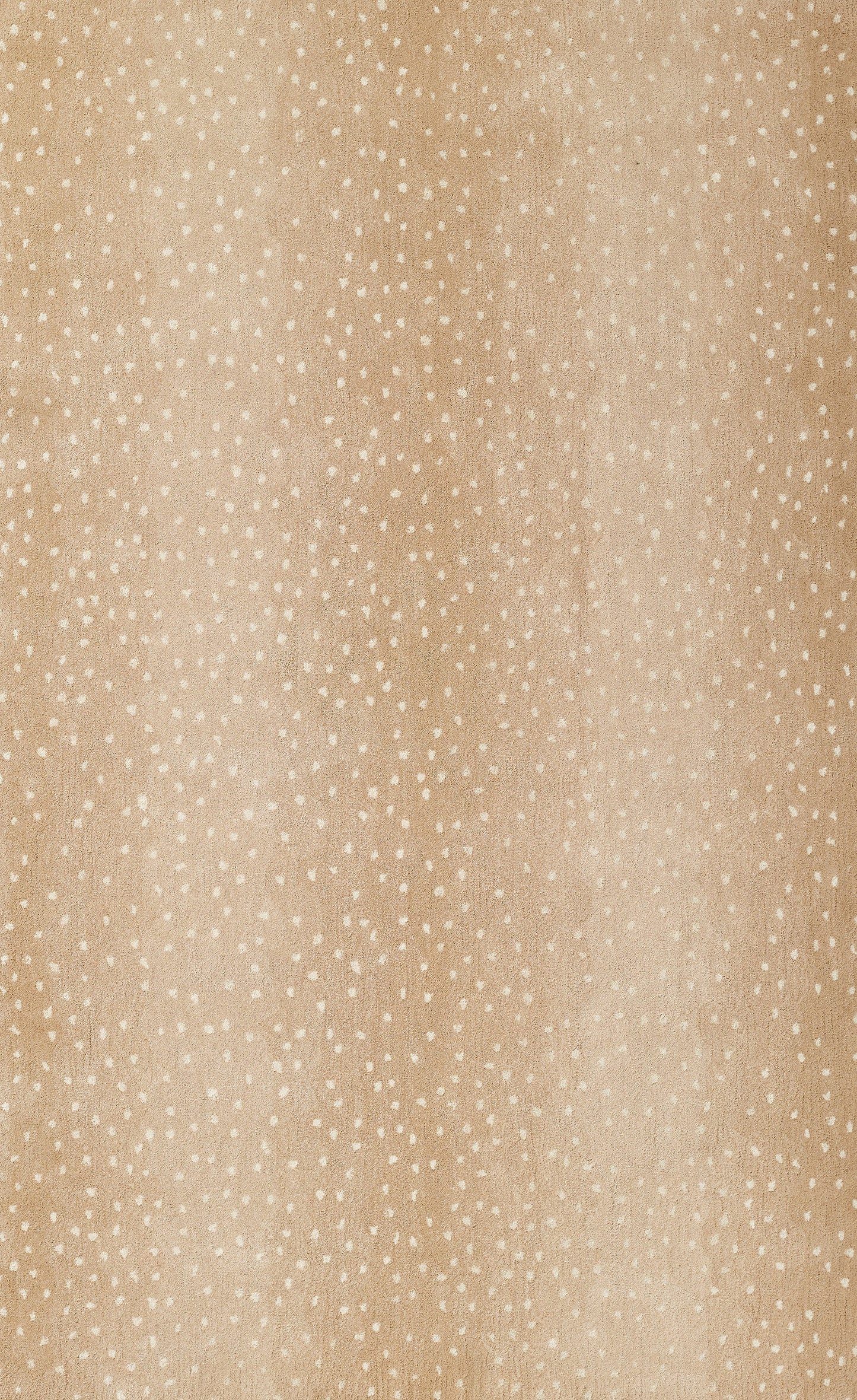 Beige fabric with tiny white polka dots; soft linen-like textile for clothing or decor.