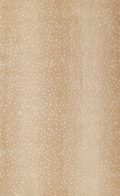 Beige fabric with tiny white polka dots; soft linen-like textile for clothing or decor.