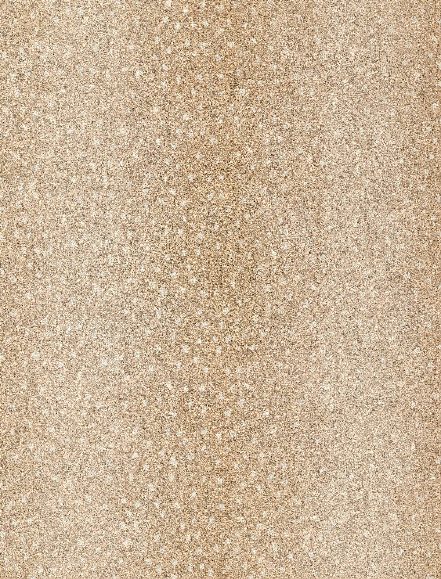 Beige speckled fabric with tiny white dots; soft textile texture for clothing or home decor.