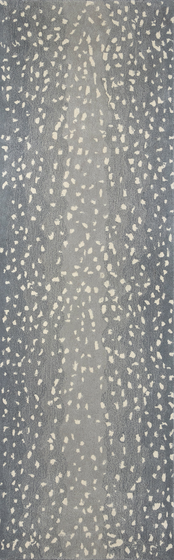 Blue-gray surface with cream irregular specks forming vertical streaks; rustic-modern speckle pattern for fabric or wallpaper.