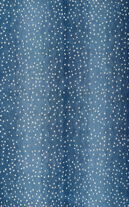 Blue denim-like fabric with scattered white speckles; casual speckled textile.