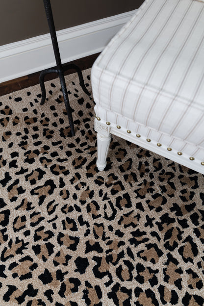 Leopard print runner rug on floor, 2'6" x 8'.