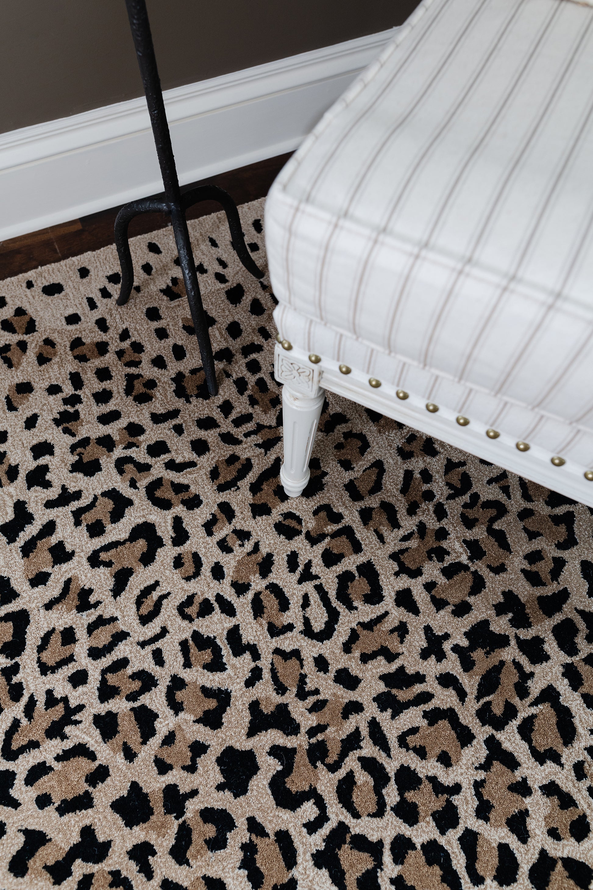 Leopard-print rug, 5' x 8'.