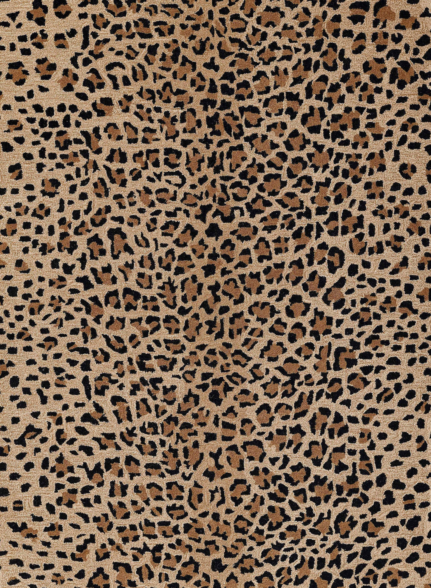Leopard print rug with tan/beige background and black-brown spots; 2' x 3' rug for home decor.