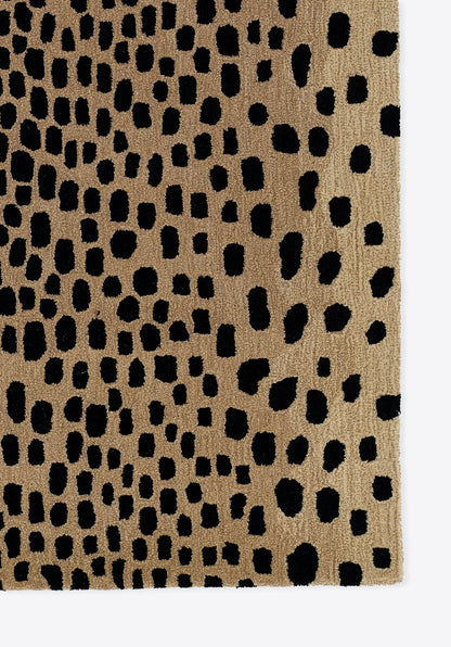 Beige textured rug with irregular cheetah-spots; woven loop pile, modern animal-print accent.