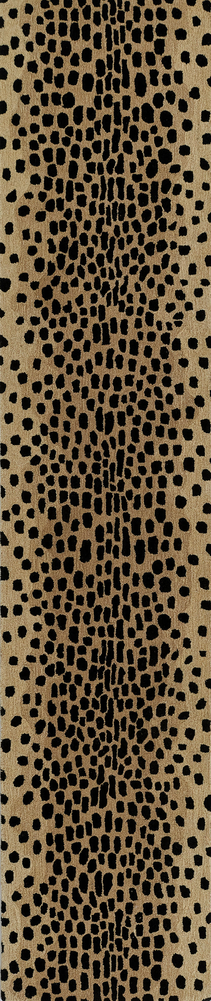 Tan rug with black cheetah print pattern, bold spots, 3'6" x 5'6
