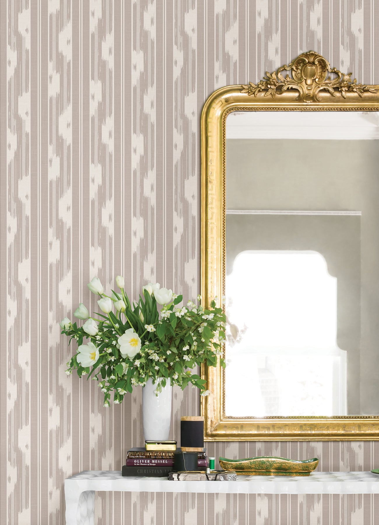 Taupe peel-and-stick wallpaper with a subtle textured pattern.