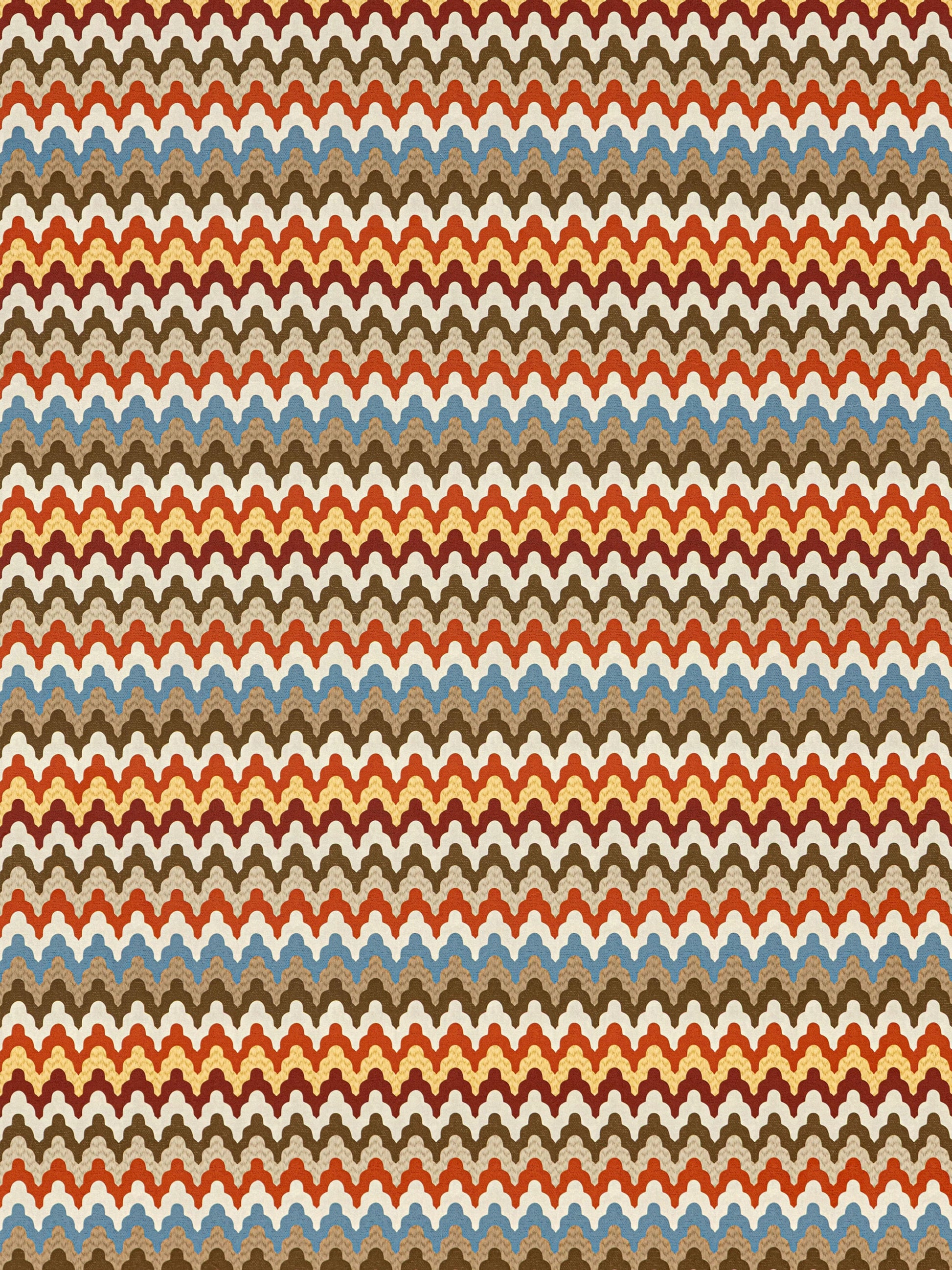 Multicolor chevron pattern with repeating scalloped arches on wallpaper in orange, brown, cream, blue and red.