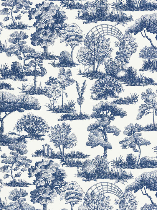 Blue and white toile garden pattern with trees, shrubs, and lattice arches.