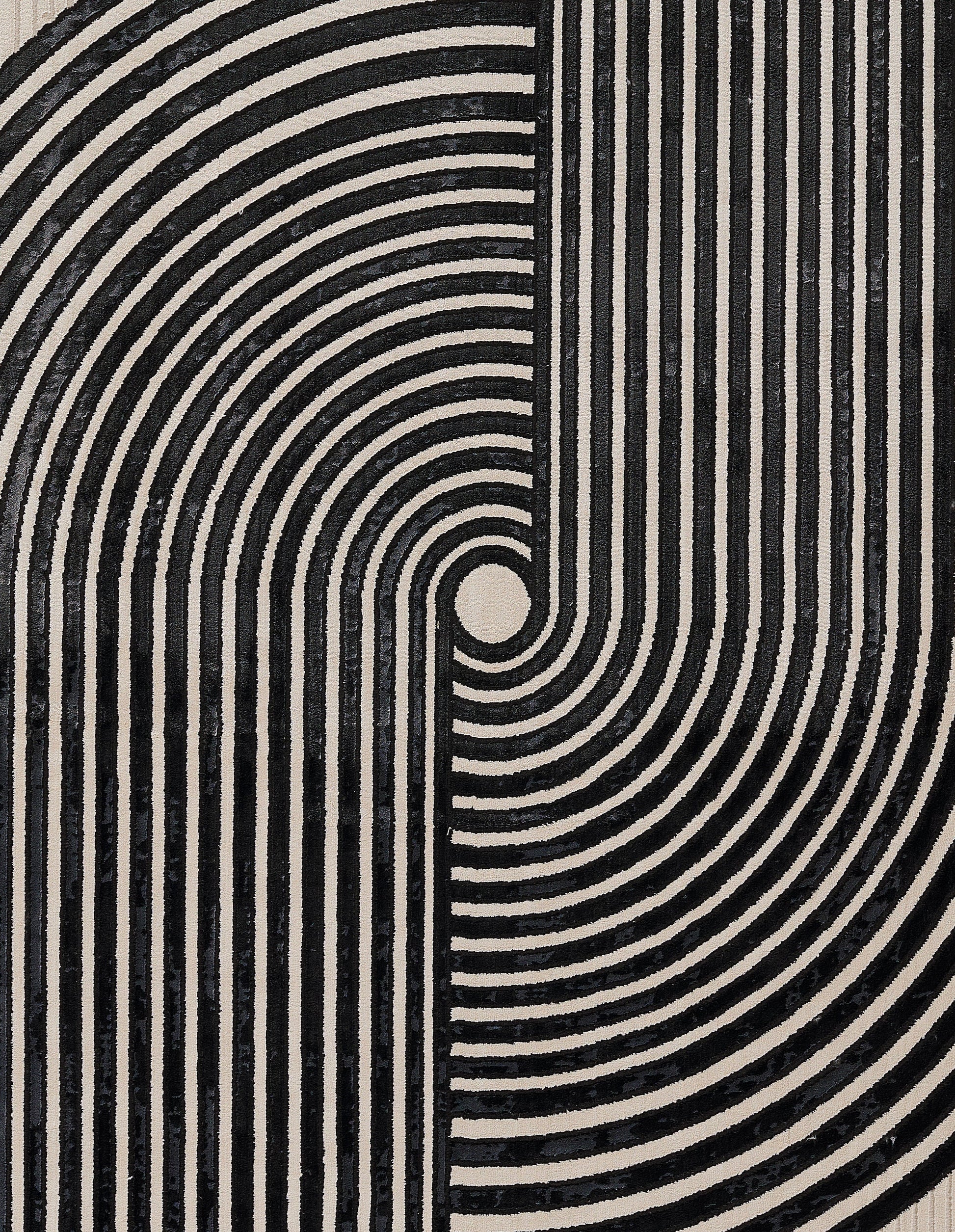 Ivory and black geometric rug with concentric circles and vertical stripes; 2' x 8' runner.