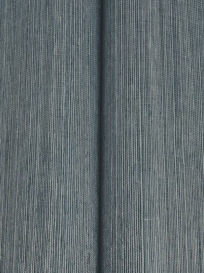 Blue-gray denim grasscloth wallpaper with a woven texture.