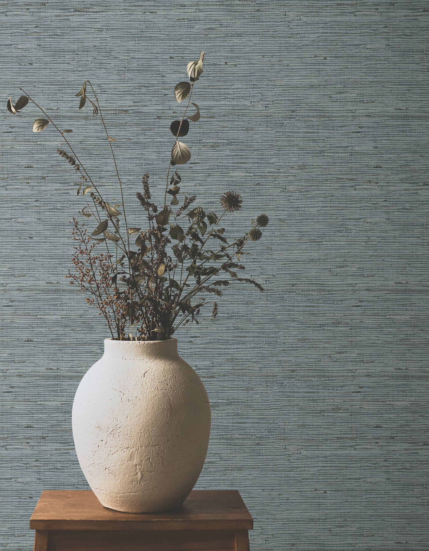 Grey mist Grasscloth wallpaper on the wall, showing a subtle textured pattern.