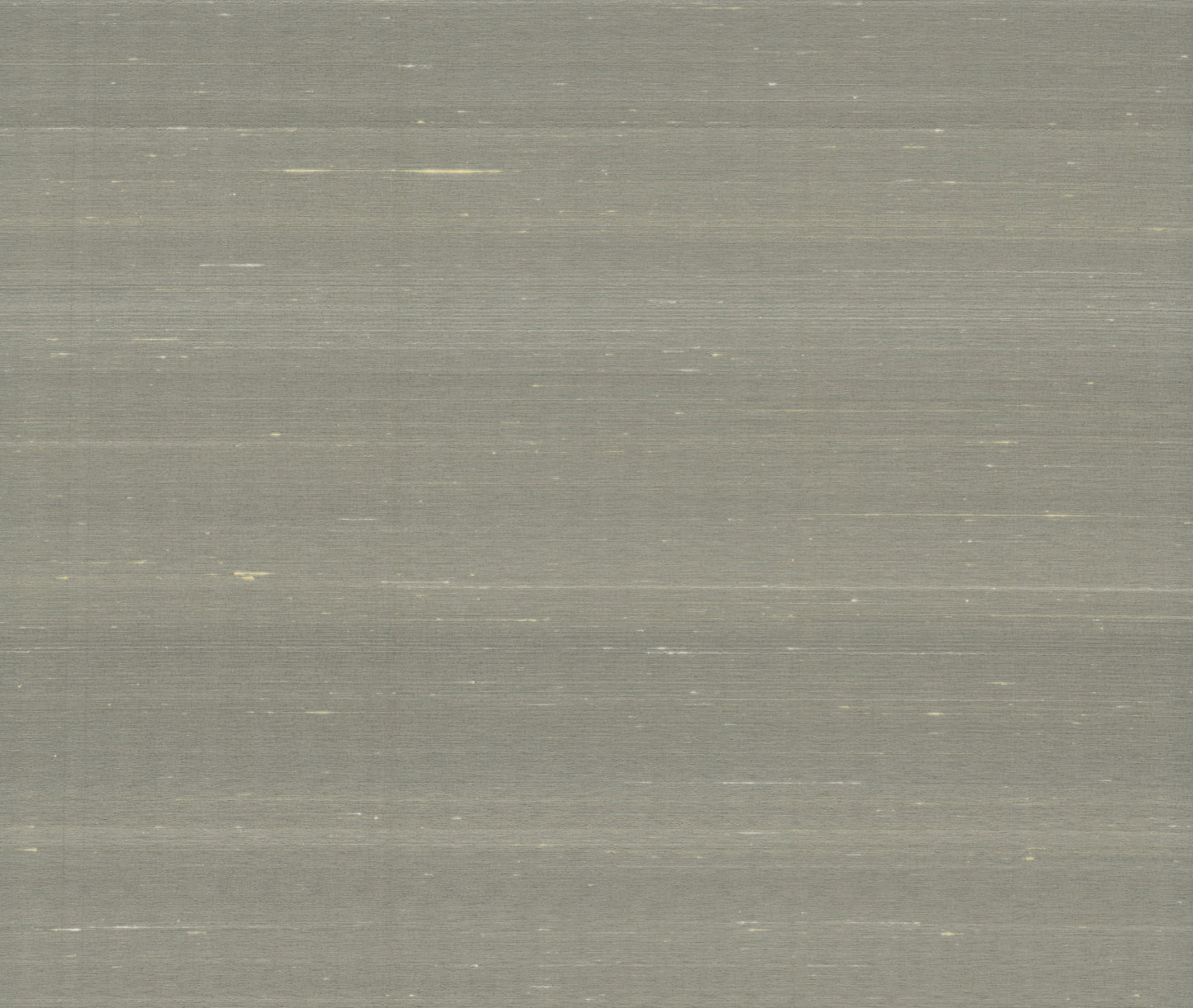 Grey brushed metal surface with subtle horizontal streaks.