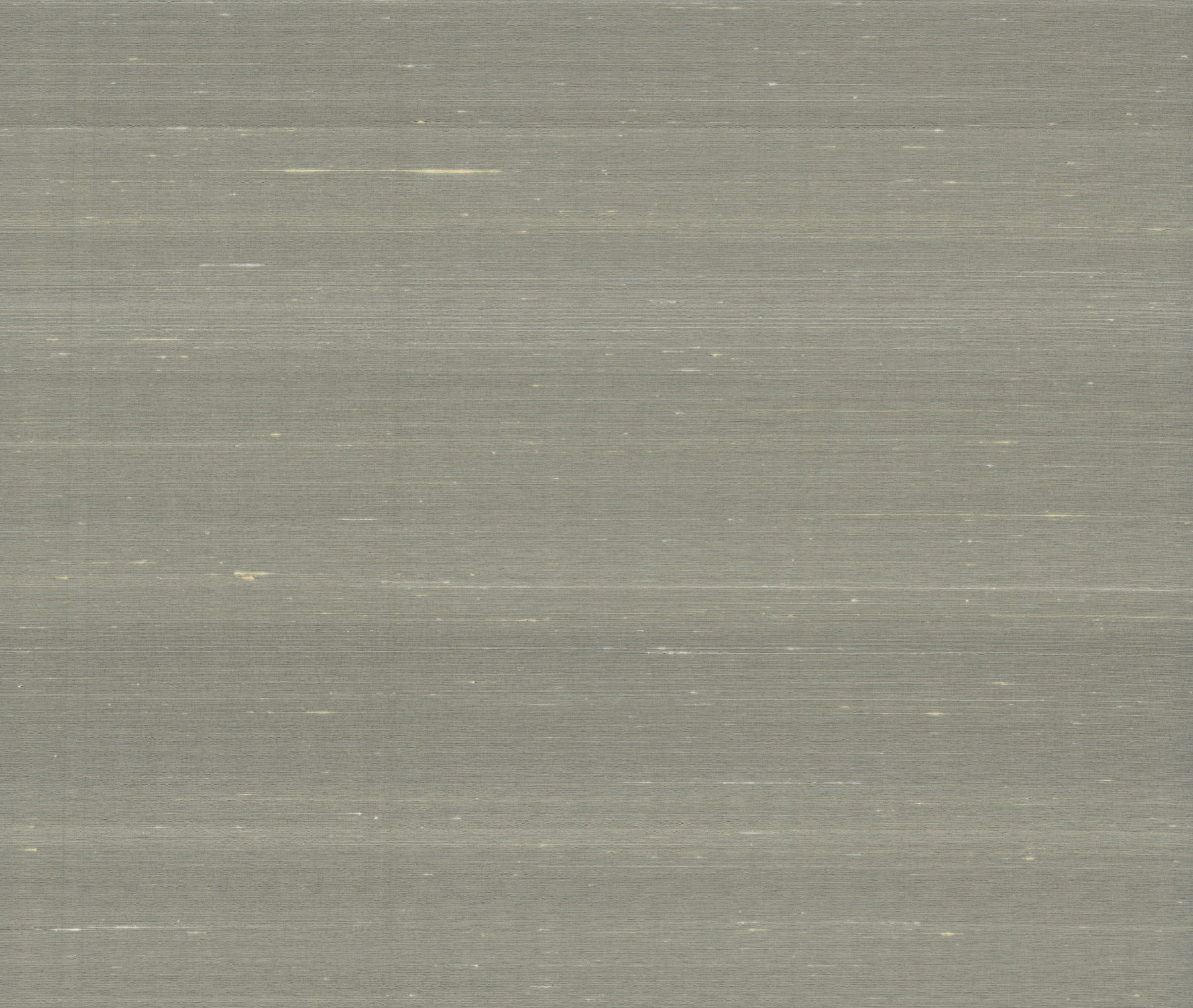 Grey brushed metal surface with subtle horizontal streaks.