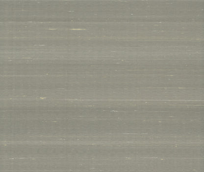 Grey brushed metal surface with subtle horizontal streaks.