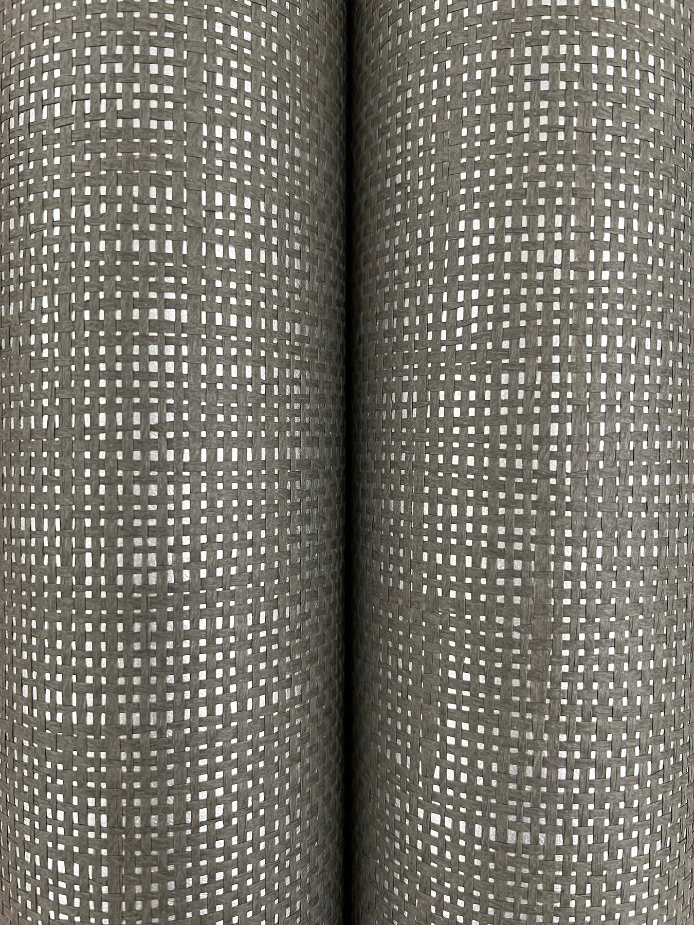 Two gray wallpaper rolls with a white square grid pattern.
