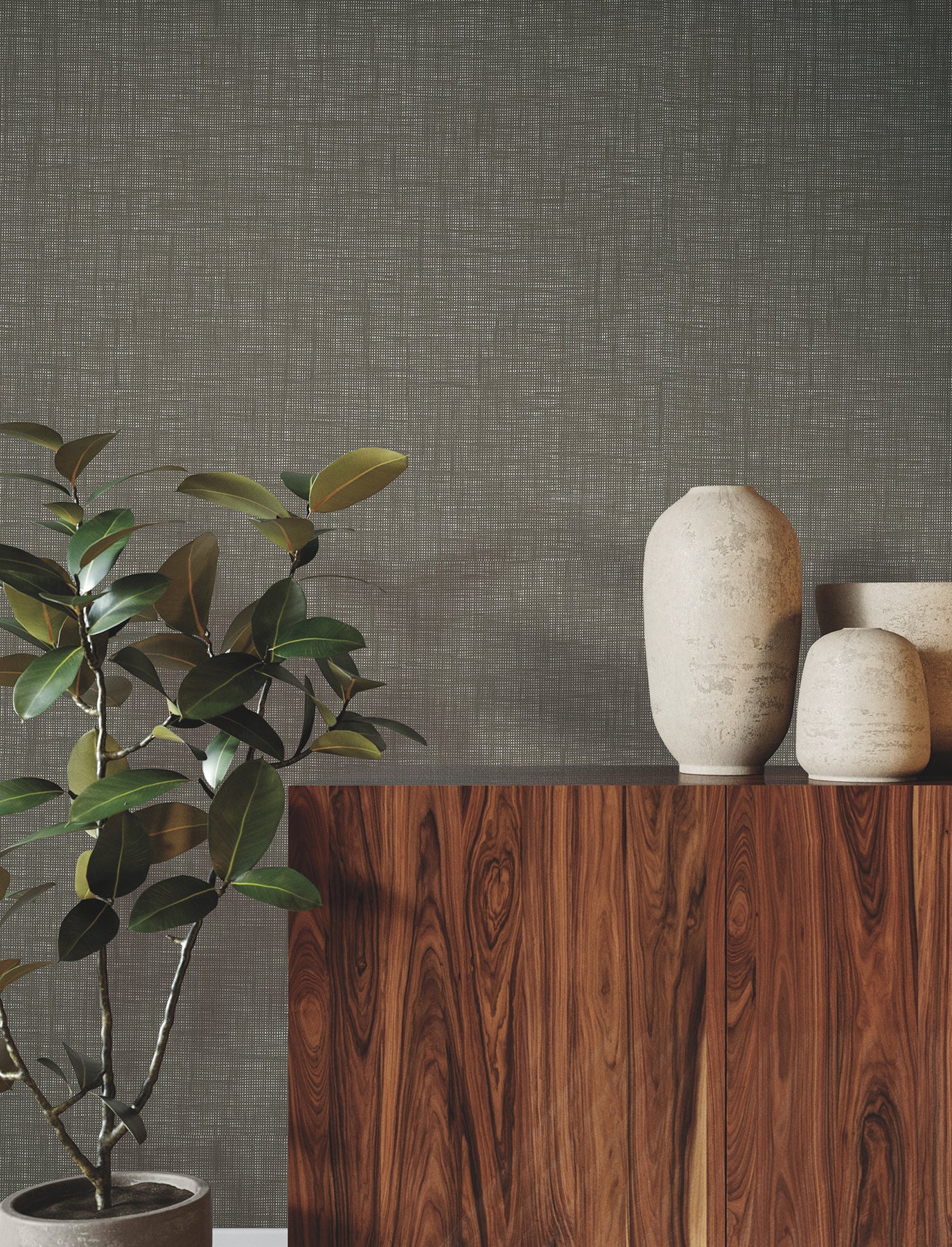 Interior wall covered with natural paperweave wallpaper, showing a textured, neutral-toned surface.