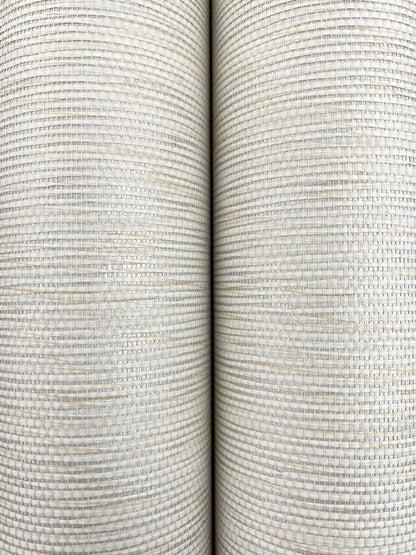 Two Oyster Pearl wallpaper rolls side by side with a textured linen-like stripe weave and subtle gray specks.