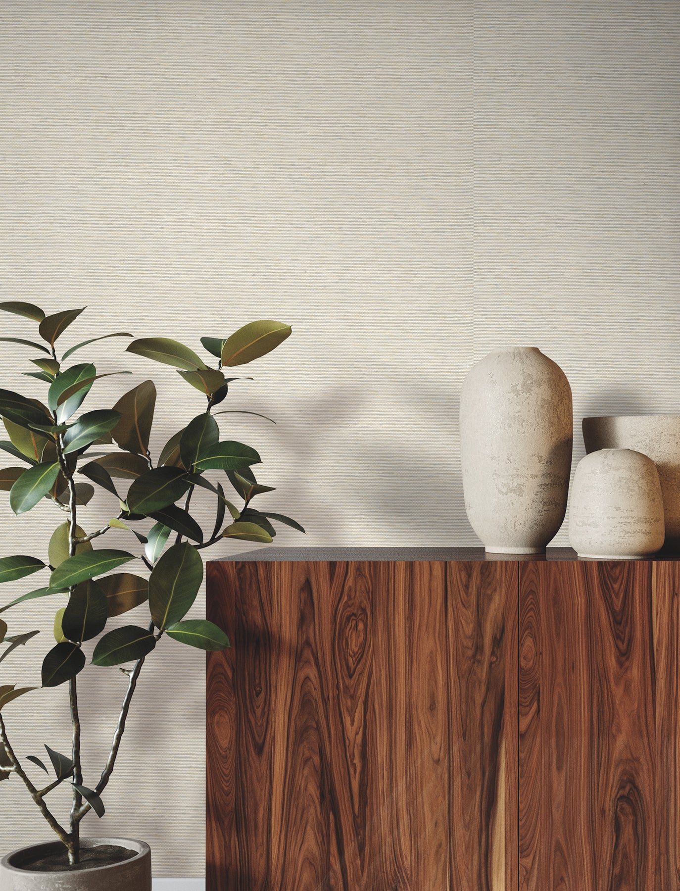 Neutral textured wallpaper with a subtle paperweave pattern in oyster pearl on the wall, with beige ceramic vases & a leafy potted plant in a room setting.