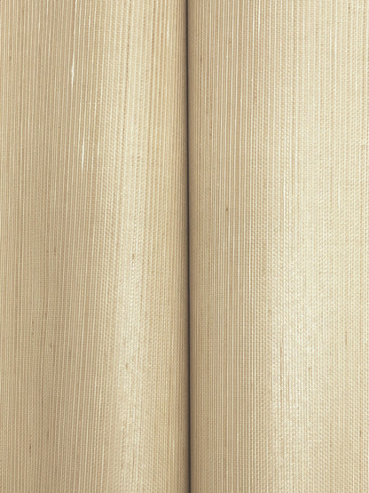 Two beige textured paper rolls side by side, close-up with subtle vertical stripes.
