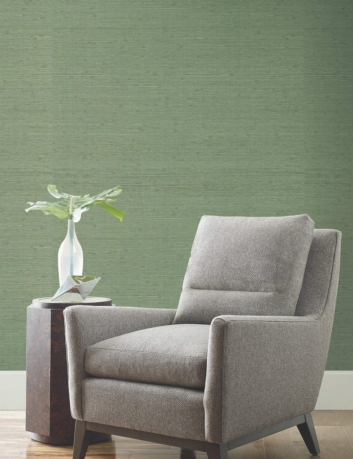Green evergreen horizontal jute grasscloth wallpaper with a textured weave.