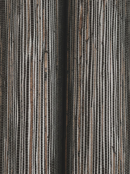 Close-up of woven grasscloth wallpaper texture in black & silver, shimmering hemp fibers with fine vertical lines.