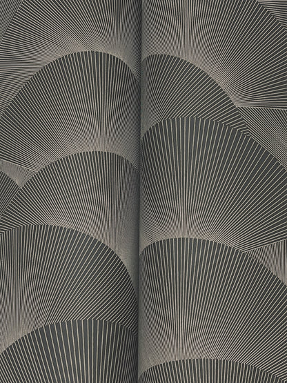 Detail view of grey wallpaper with overlapping fan-shaped arcs and radiating lines in a monochrome geometric pattern.