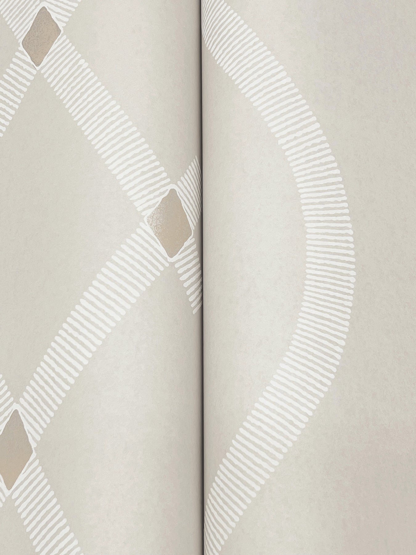 Grey wallpaper detail with geometric diamond motif and a white dashed curved stripe; two-panel seam