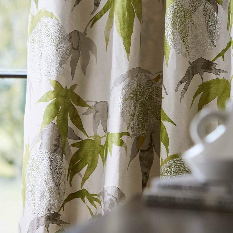 Close-up view of Zoffany Acer “Platinum / Leaf” fabric showing embroidered trailing leaf motif and chrysanthemum accents on a silk‑linen blend in soft platinum and leaf tones — perfect for elegant drapery, cushions, or accent upholstery.
