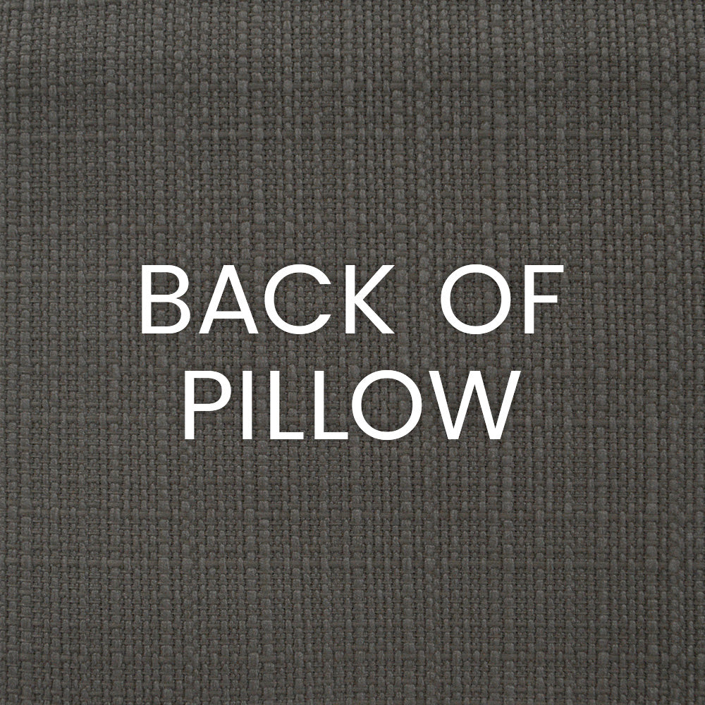 Back view of a charcoal pillow with textured dark gray fabric.
