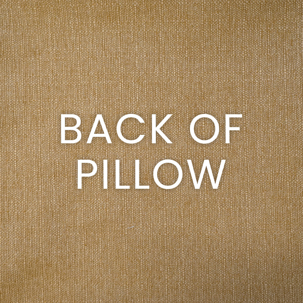 Back of pillow cover in golden textured weave; warm beige-gold fabric with subtle texture.