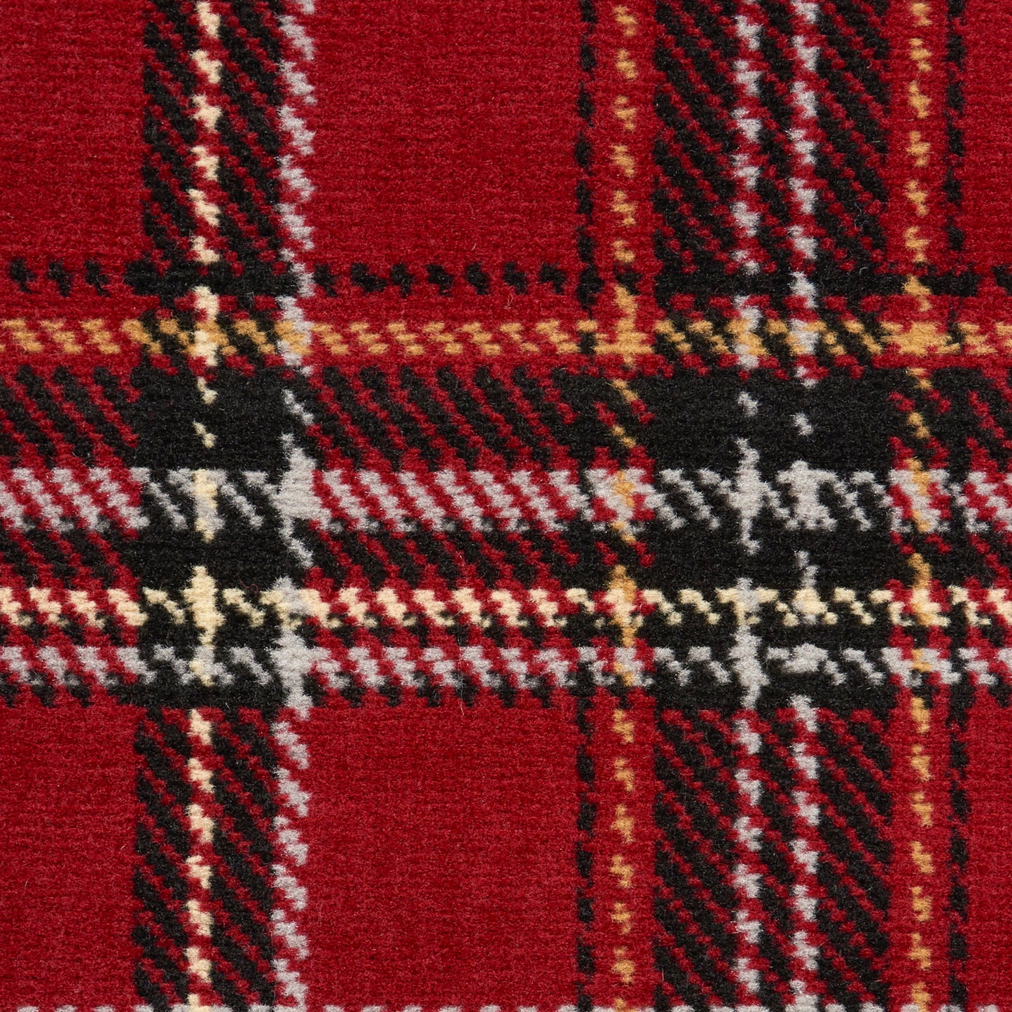 Close-up of red tartan plaid rug fabric with black, white and gold stripes; woven wool texture.
