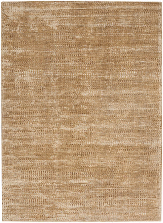 Beige flat-weave area rug with distressed texture and warm tan tones.
