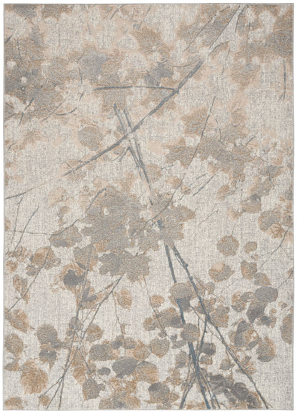 Neutral beige-gray rug with abstract leaf and branch pattern, soft textured surface.