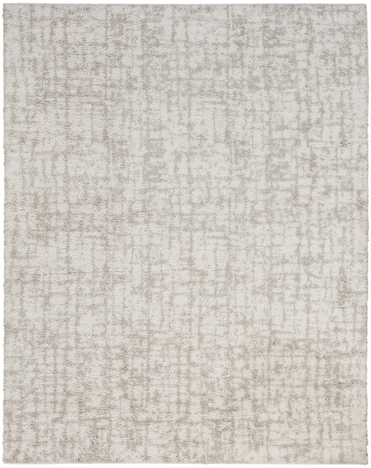 Light beige and gray abstract textured area rug with soft plush pile, contemporary distressed pattern.