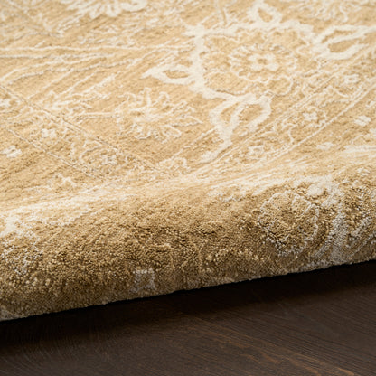 Beige oriental rug with white floral motif, plush pile, rolled edge on dark wood floor.