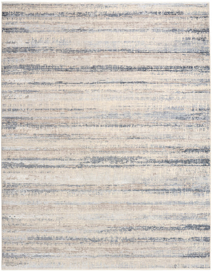 Rectangular area rug with cream, beige and blue-gray distressed horizontal stripes.