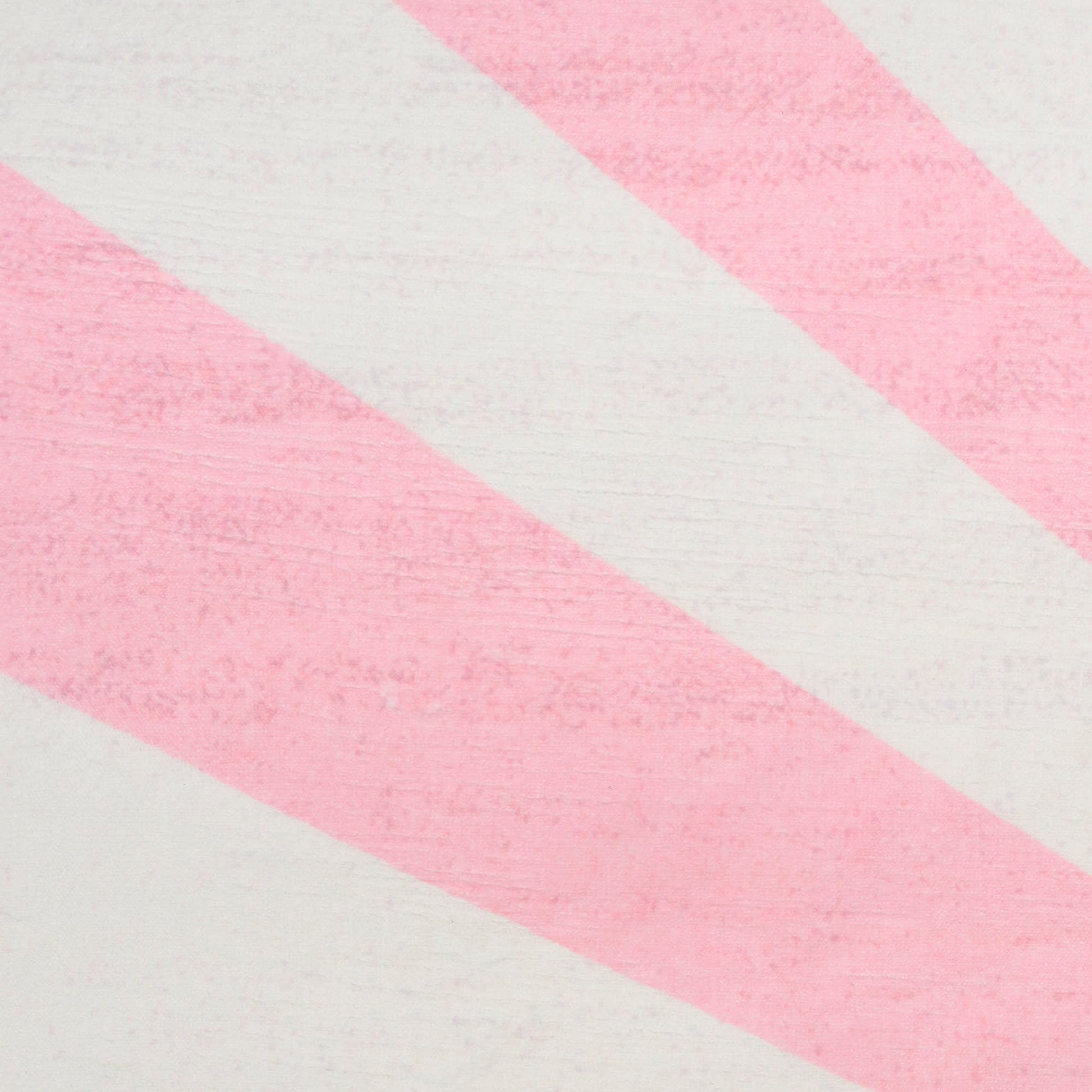 Kids rug with a pale background & bold diagonal pink stripes in a retro pastel design; size 5' x 7'.