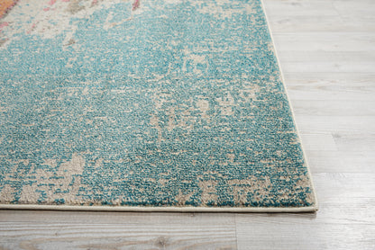 Turquoise teal abstract area rug with cream-beige distressed pattern; rectangular modern floor covering for living spaces.