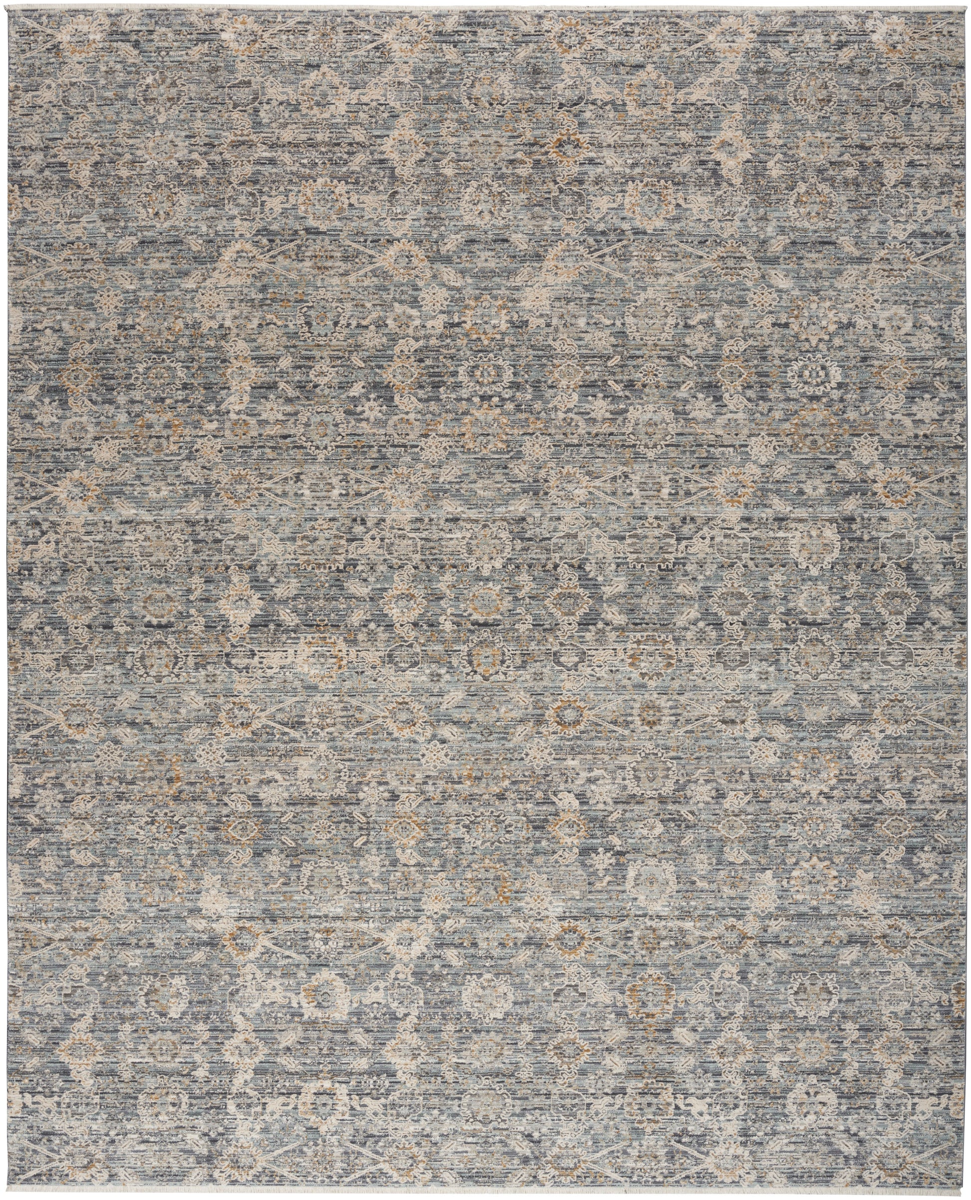 Distressed blue-gray oriental rug with faded beige floral medallion pattern; versatile for living room decor.