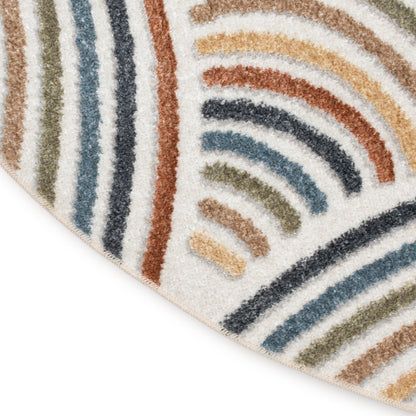 Shaggy area rug with multicolored curved stripes in olive, navy, rust, blue and tan; corner fold shows ivory background.